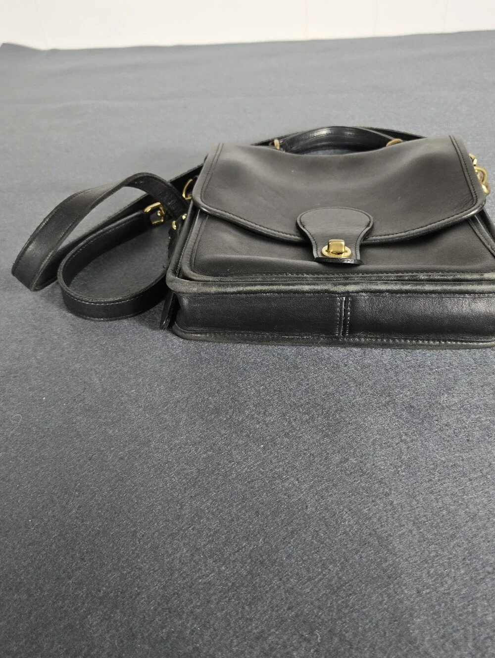 Coach logo embossed
